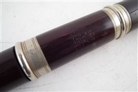 Lot 39 - Rosewood flute by J. Wallis London, with mahogany fitted case