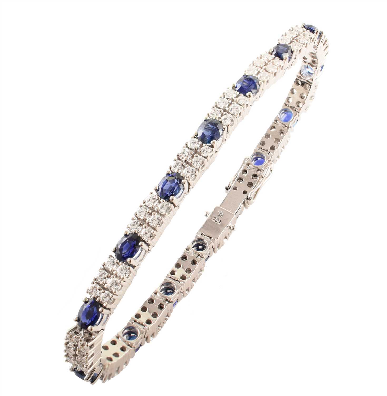 Lot 28 - Sapphire and diamond two-row 18ct white gold line bracelet