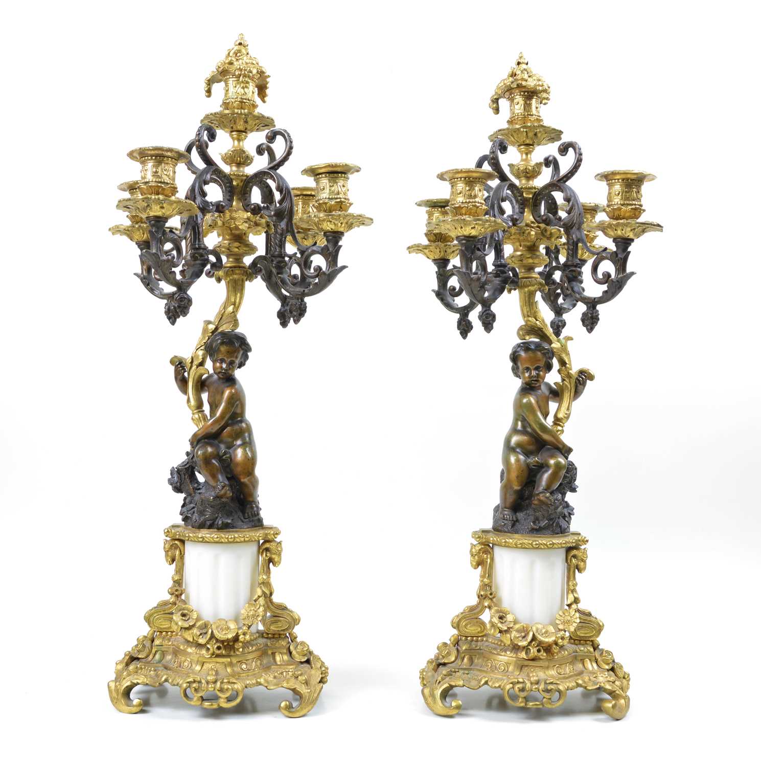 331 - A pair of early 20th-century bronze and ormolu mounted four branch candelabra