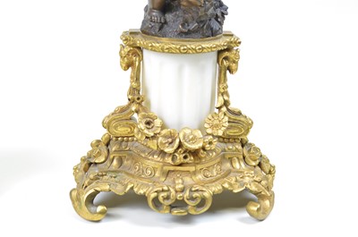 Lot 331 - A pair of early 20th-century bronze and ormolu mounted four branch candelabra