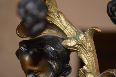 Lot 331 - A pair of early 20th-century bronze and ormolu mounted four branch candelabra