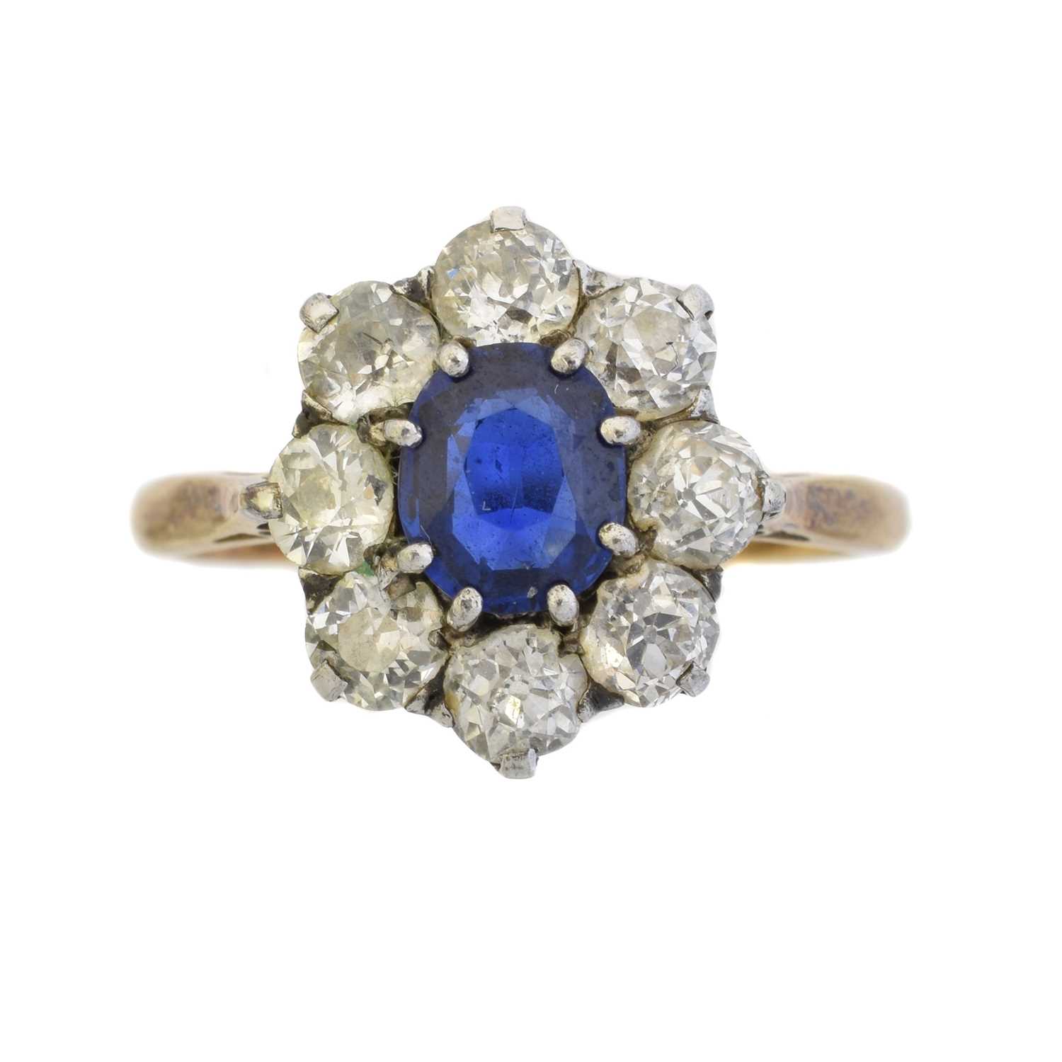 Lot 119 - An 18ct gold sapphire and diamond cluster ring
