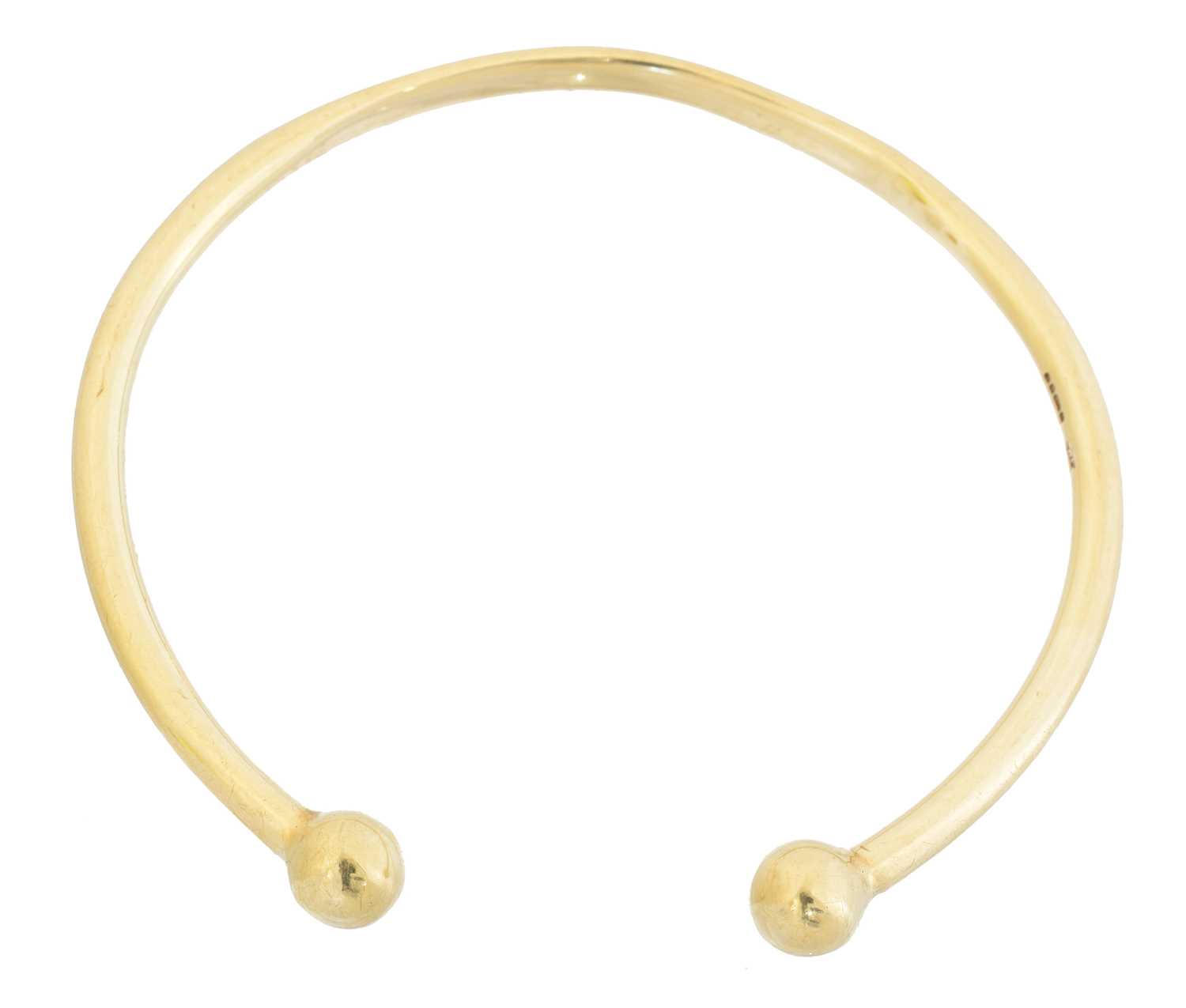Lot 29 - A 9ct gold torque bangle