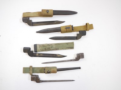 Lot 75 - Five No.4 Lee Enfield Rifle bayonets and a trench art bayonet