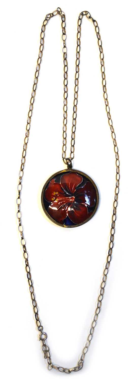 Lot 128 - Moorcroft Hibiscus pendant