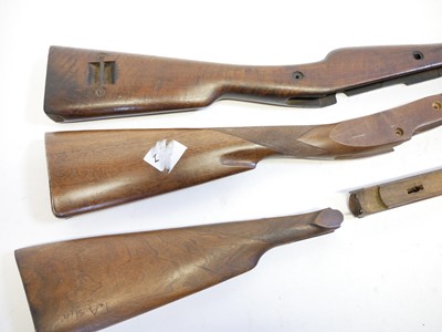 Lot 268 - Berthier rifle stock and two other stocks and a forend