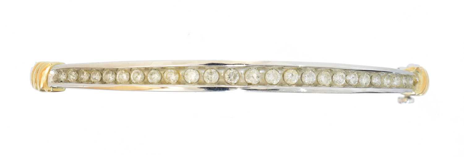 Lot 45 - A diamond hinged bangle