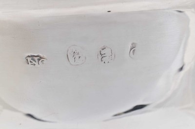 Lot 30 - A Queen Anne Britannia silver shaving bowl