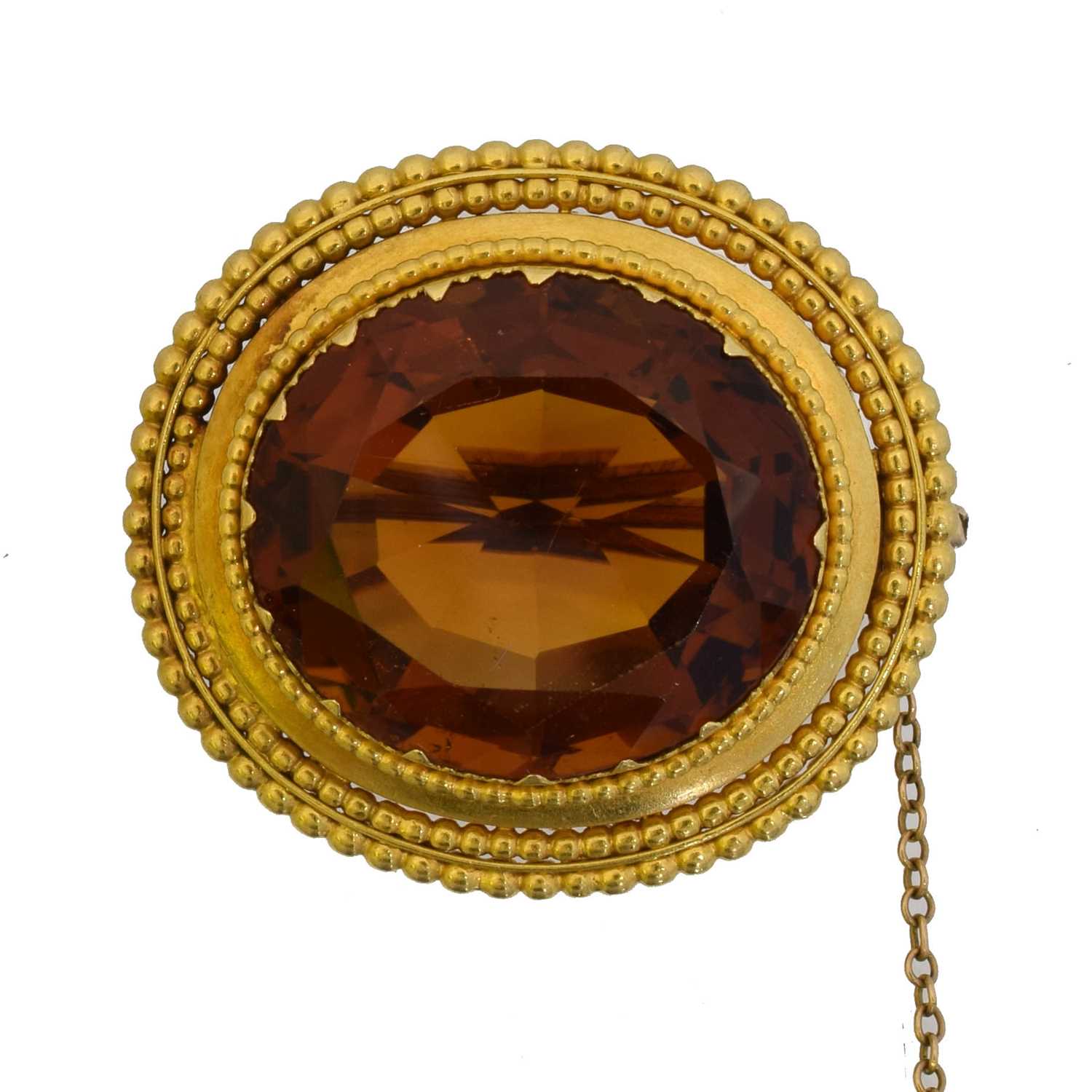 Lot 21 - A Victorian citrine brooch.