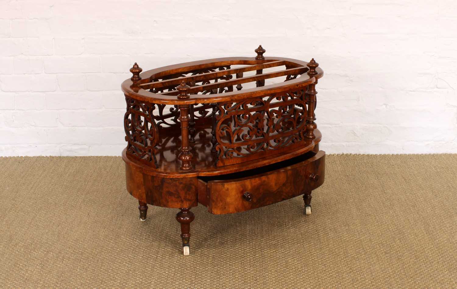 Lot 167 - A Victorian Burr Walnut Canterbury