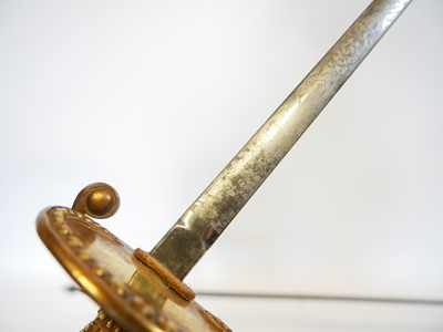 Lot 165 - Two court swords, one with the majority of the...
