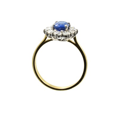 Lot 7 - An oval cut 2.00ct sapphire and diamond cluster ring set in 18ct gold