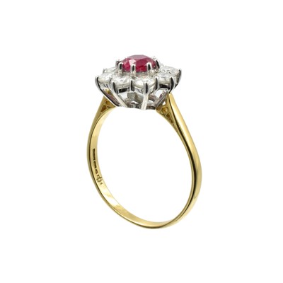 Lot 15 - A 1.30ct synthetic ruby and diamond cluster ring in 18ct gold