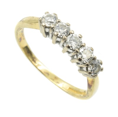 Lot 155 - An 18ct yellow gold and diamond five-stone ring
