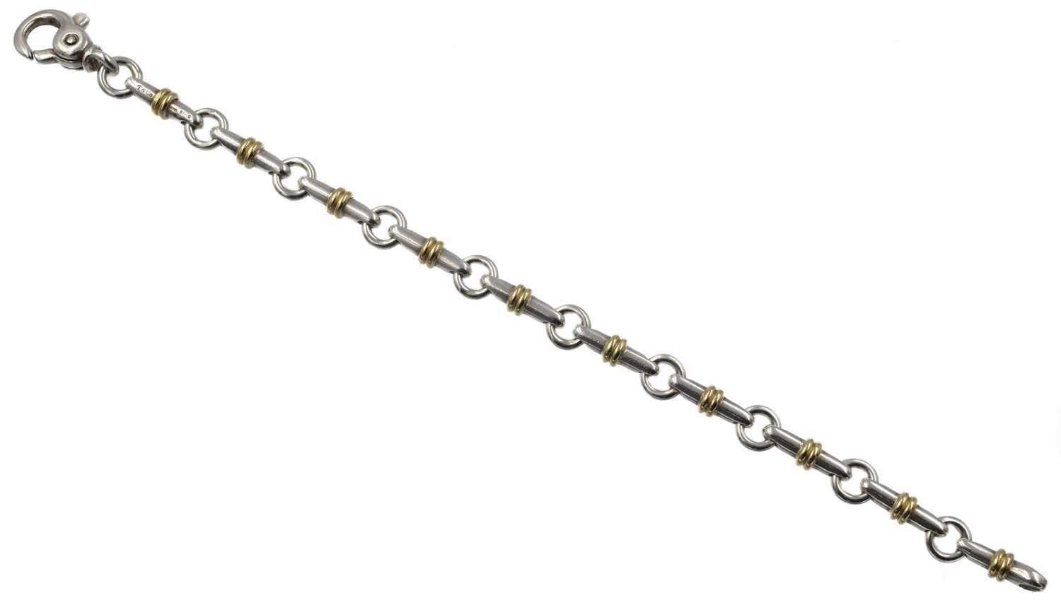 Lot An 18ct and silver Tiffany bracelet