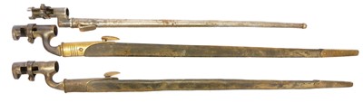 Lot 305 - Three socket bayonets and scabbards, to...