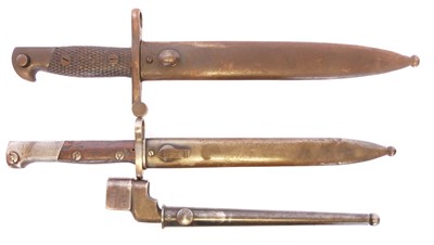 Lot 271 - Three bayonets and scabbards, to include a...