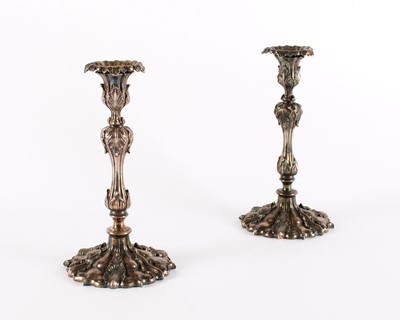 Lot A Pair of 19th Century 'Rococo Revival' Silver Plated Candlesticks