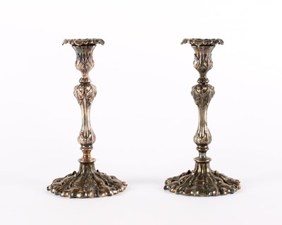 Lot A Pair of 19th Century 'Rococo Revival' Silver Plated Candlesticks