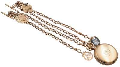 Lot 53 - A gold-plated Falcon Lever pocketwatch, attached to two 9ct gold chains