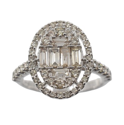 Lot 95 - A 9ct gold and diamond oval cluster ring