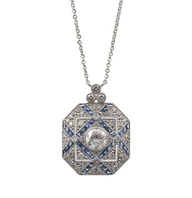 Lot 121 - A platinum, diamond and sapphire tablet pendant