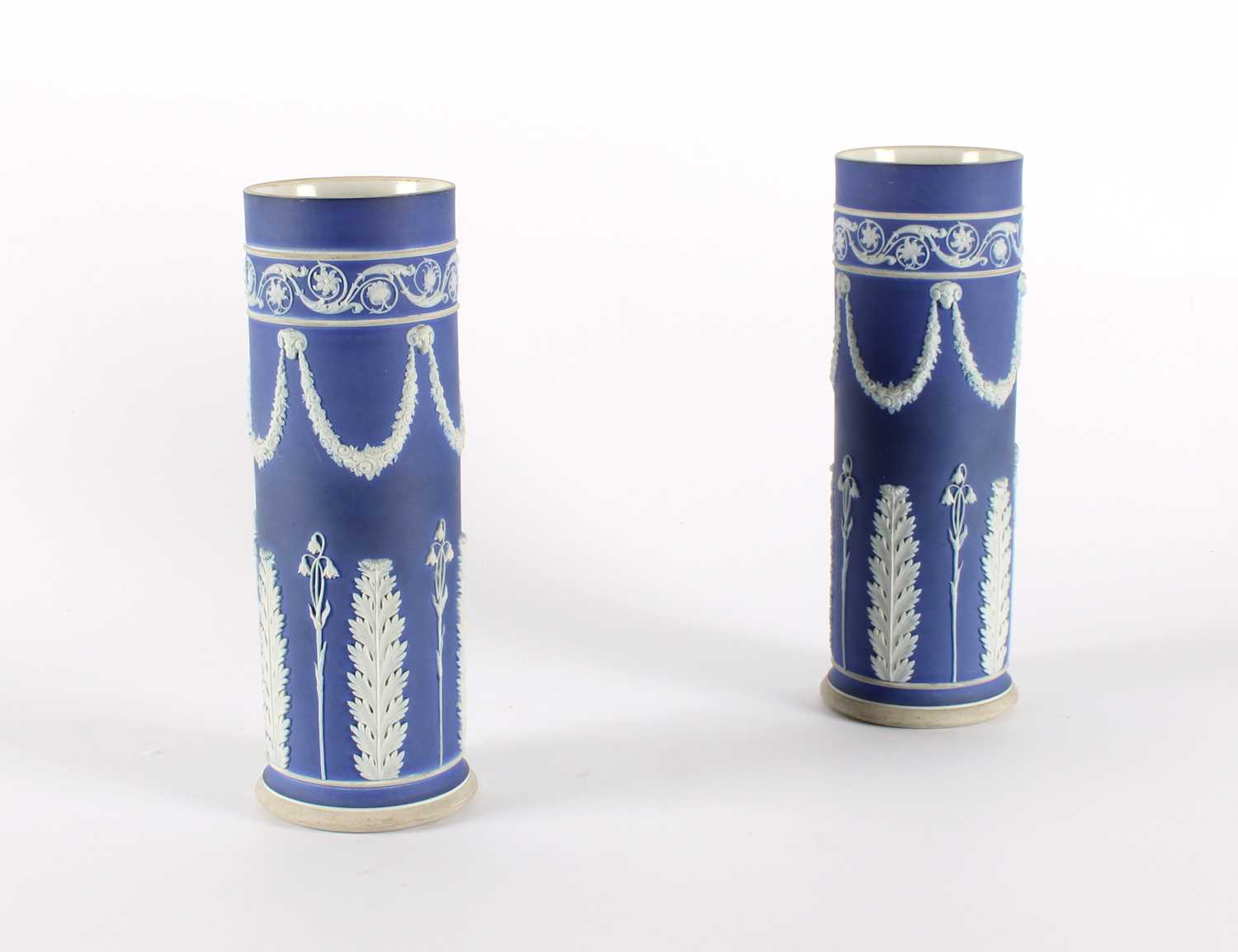 Lot A Pair of Tall Wedgwood Blue Jasperware Sleeve Vases