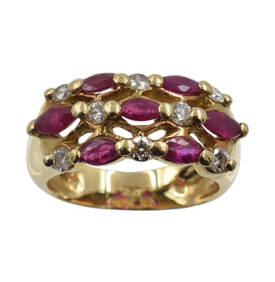 Lot 142 - An 18ct gold, ruby and diamond cluster ring