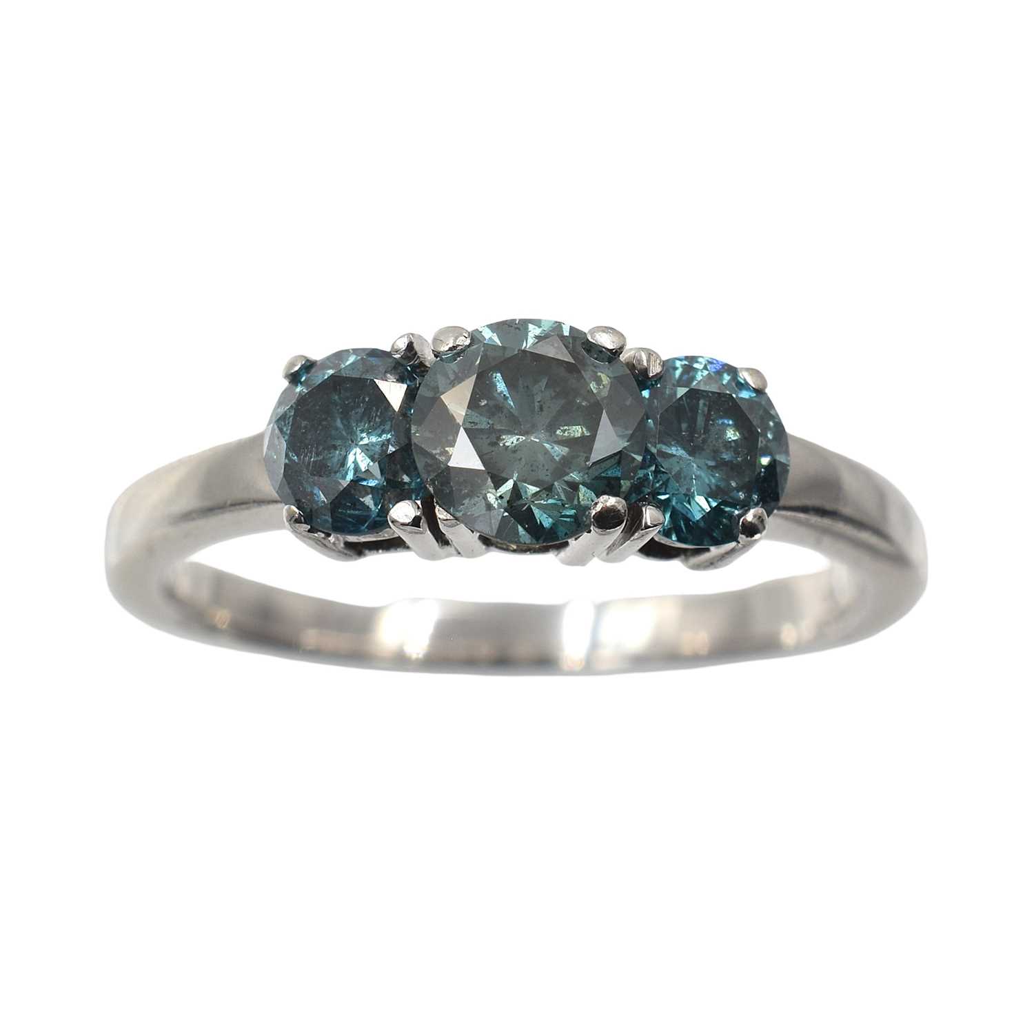 Lot 50 - A 14ct gold and blue diamond trilogy ring