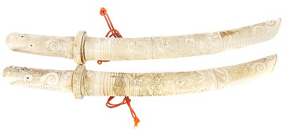 Lot Pair of Japanese bone tanto, each with 9inch...