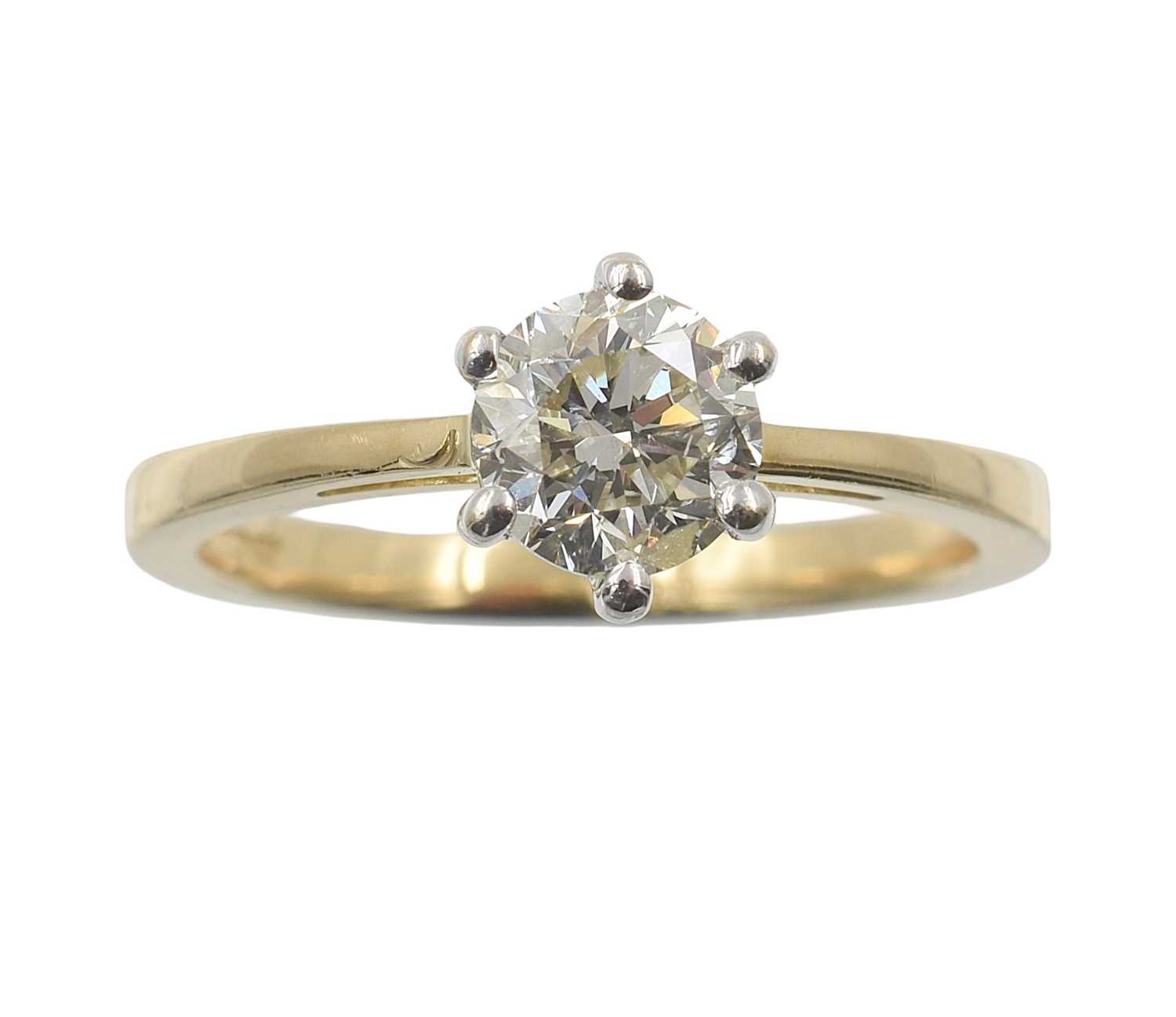 Lot An 18ct gold and diamond solitaire ring