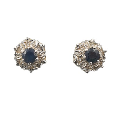 Lot 117 - A paid of sapphire and platinum earrings