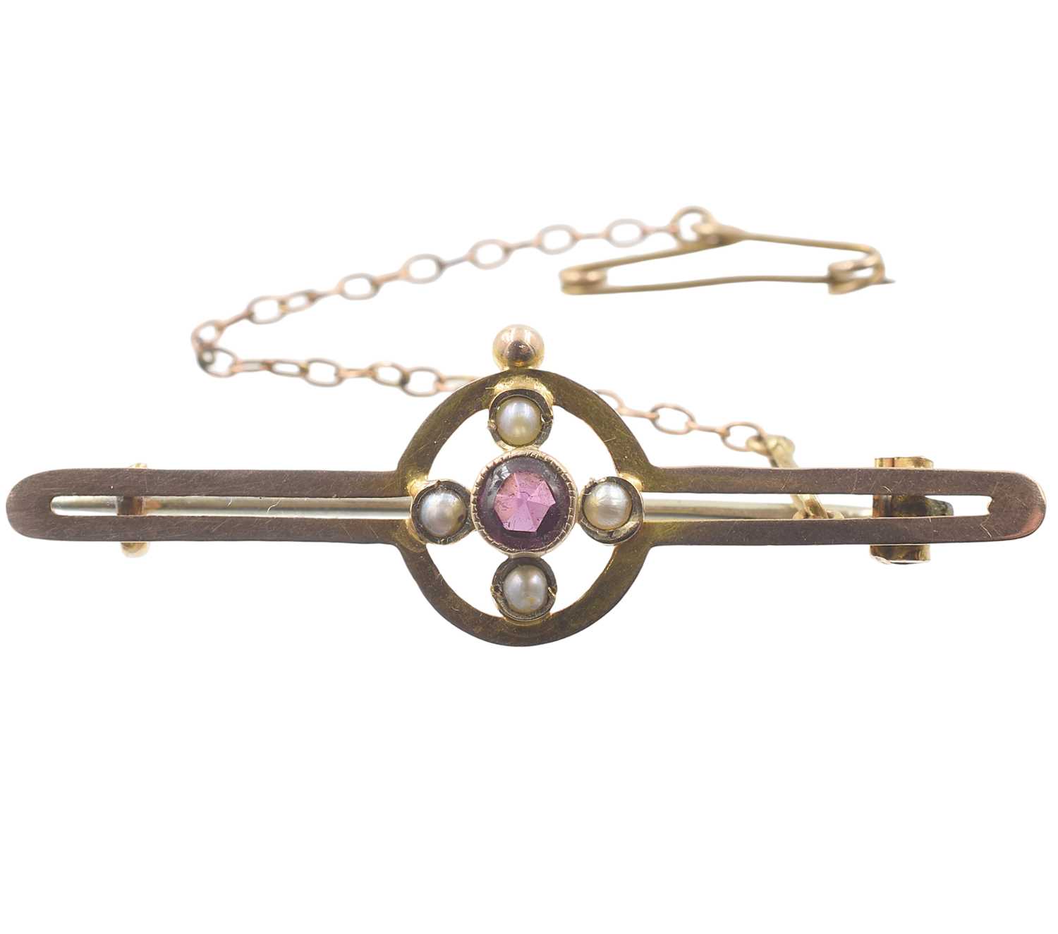 Lot A 9ct Edwardian garnet and split-pearl brooch