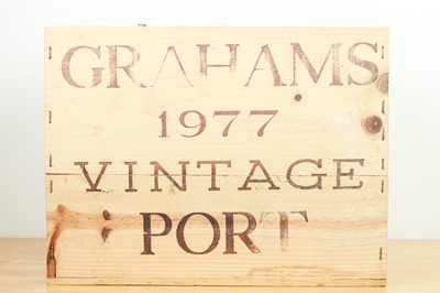 Lot 121 - 10 bottles in OWC Graham’s Vintage Port 1977