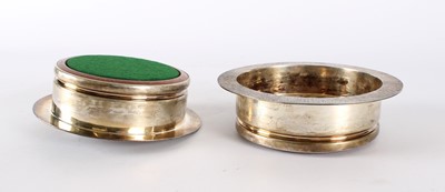 Lot 44 - A Pair of Elizabeth II Modernist Silver Mounted Bottle Coasters