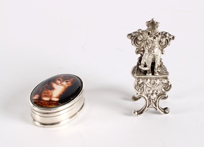 Lot 12 - An Elizabeth II Silver and Enamel Kitten Pill Box