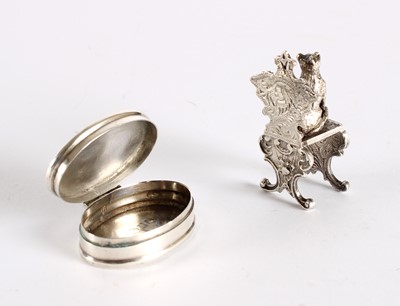 Lot 12 - An Elizabeth II Silver and Enamel Kitten Pill Box