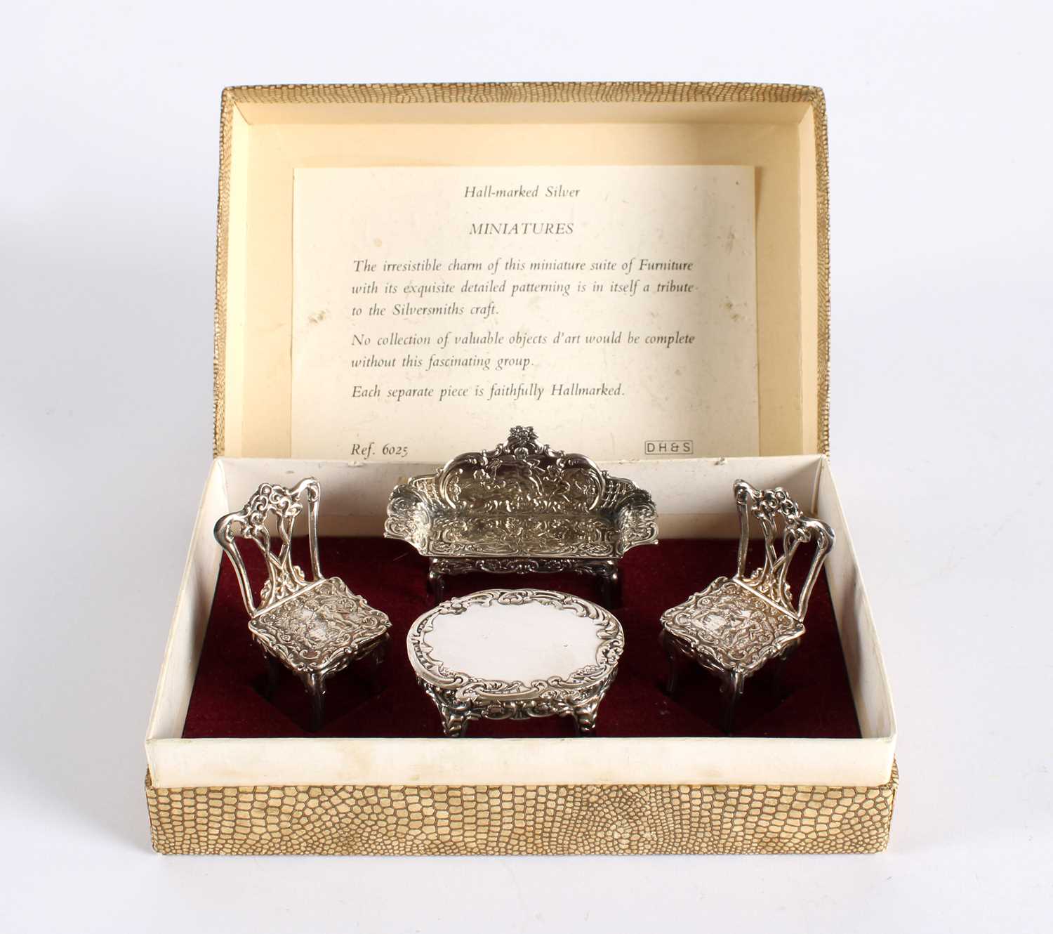 Lot 10 - A Suite of Elizabeth II Silver Miniature or Doll's House Furniture Presented in the Original Fitted Box