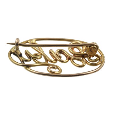 Lot A yellow metal "baby" brooch