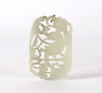 Lot 69 - A Chinese Carved and Pierced White Jade Pendant or Amulet