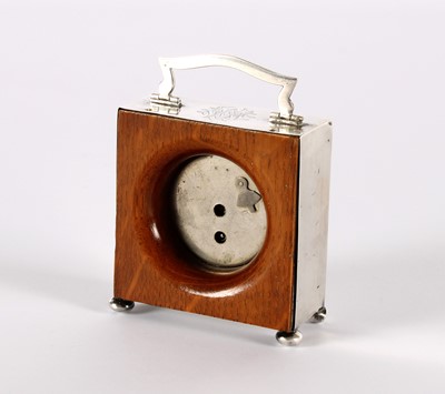 Lot 13 - An Early 20th Century Silver Mounted Bedside or Travelling Clock