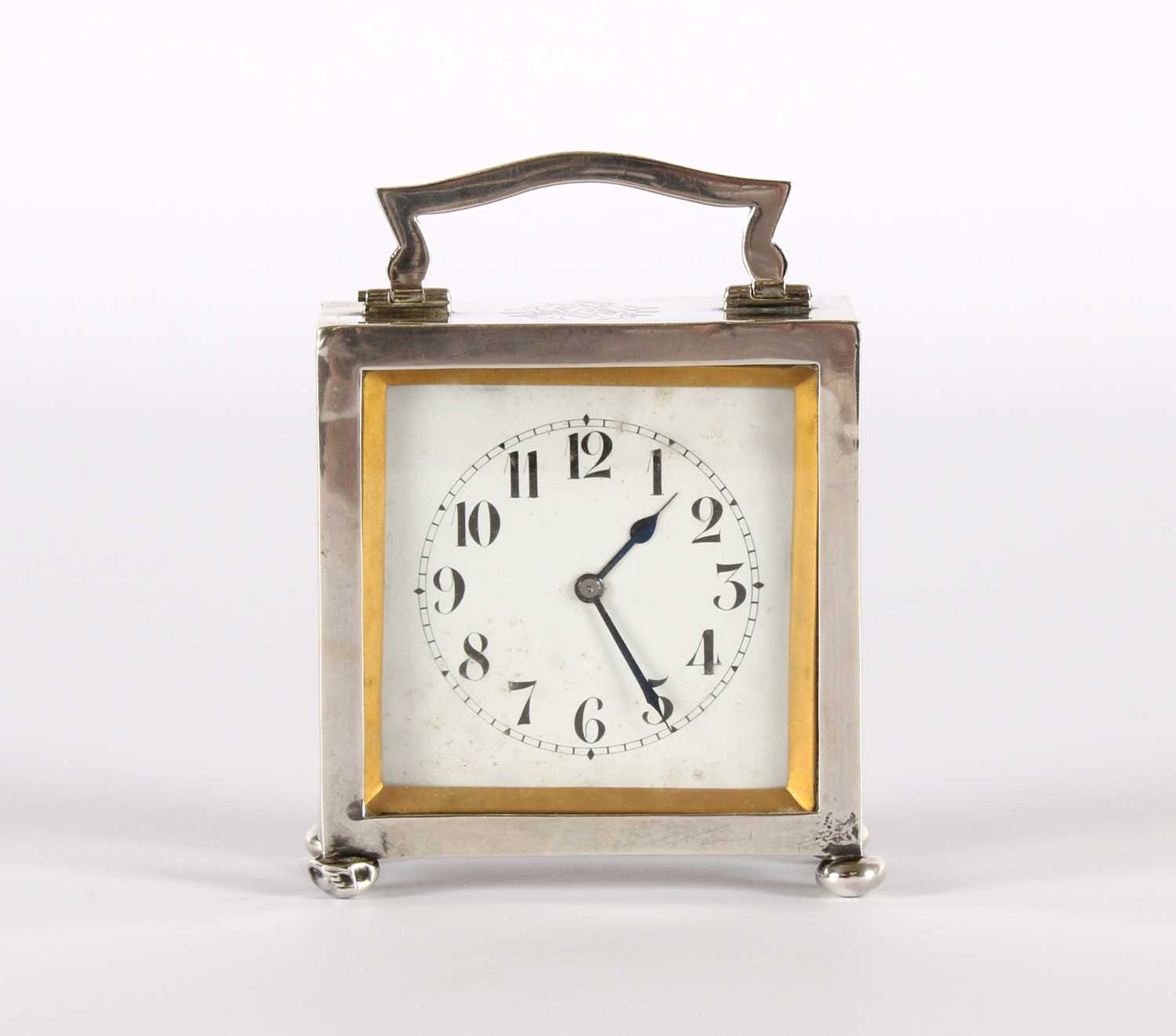 Lot 13 - An Early 20th Century Silver Mounted Bedside or Travelling Clock