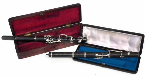 28 - Two piccolos with cases (1 original).