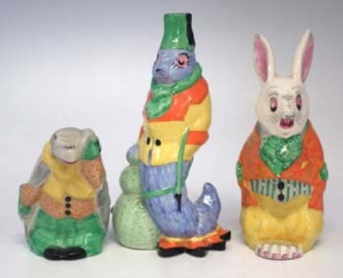 Lot 218 - Three Alice in Wonderland figures.
