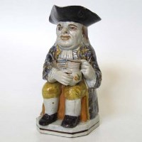 Lot 142 - Pratt ware toby jug.