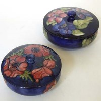 Lot 205 - Two Moorcroft lidded bowls.