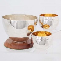 Lot 262 - Vase-shaped silver bowl on turned wood stand; a