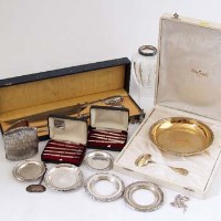 Lot 284 - Group of silver dishes, cigarette case, windmill