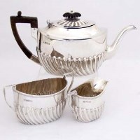 Lot 313 - Three piece silver bachelor’s tea set.
