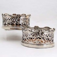 Lot 349 - Pair of Silver plated decanter coasters with pierced borders